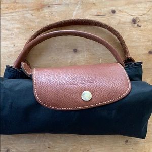 Classic Longchamp Le Pliage tote.